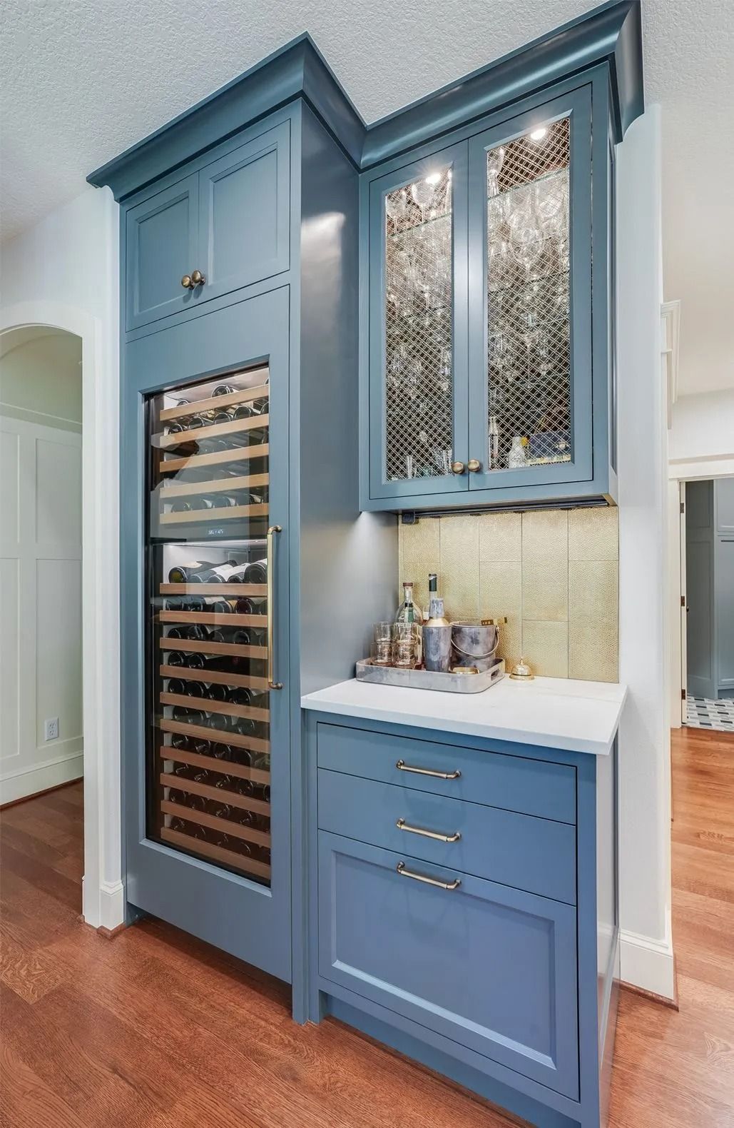 Elegant kitchen corner with blue cabinetry