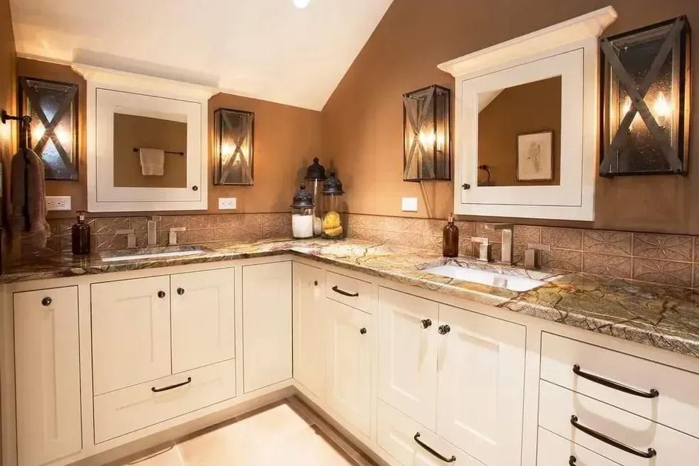 Warm-toned bathroom with wall sconces