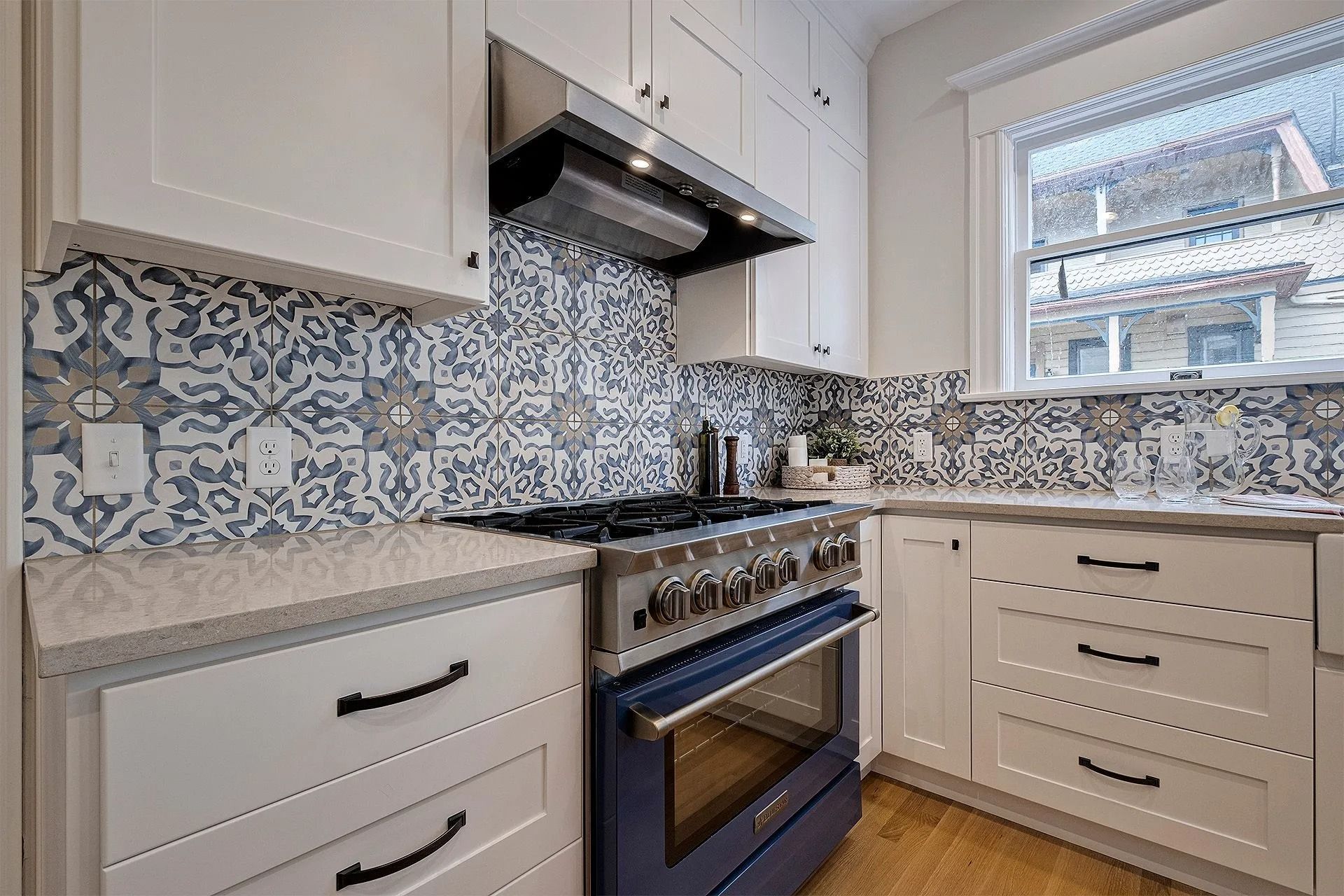 Bright kitchen featuring decorative wall tiles