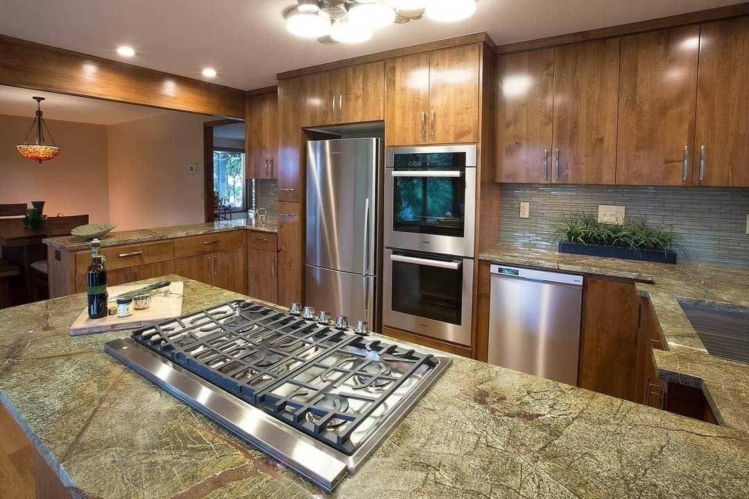 Spacious kitchen featuring wooden cabinets