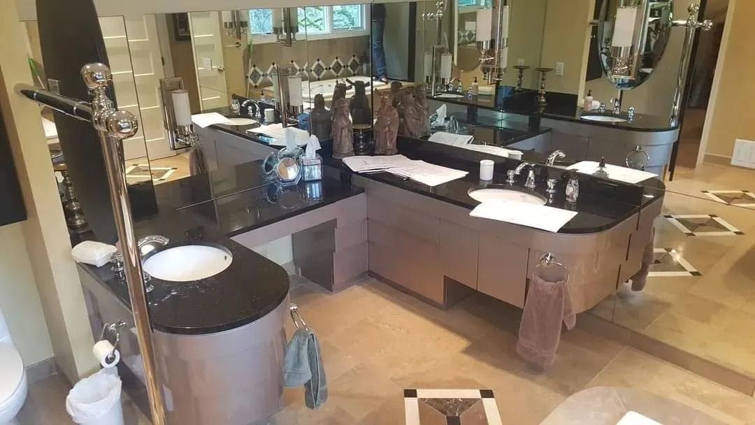 Modern bathroom featuring marble countertops