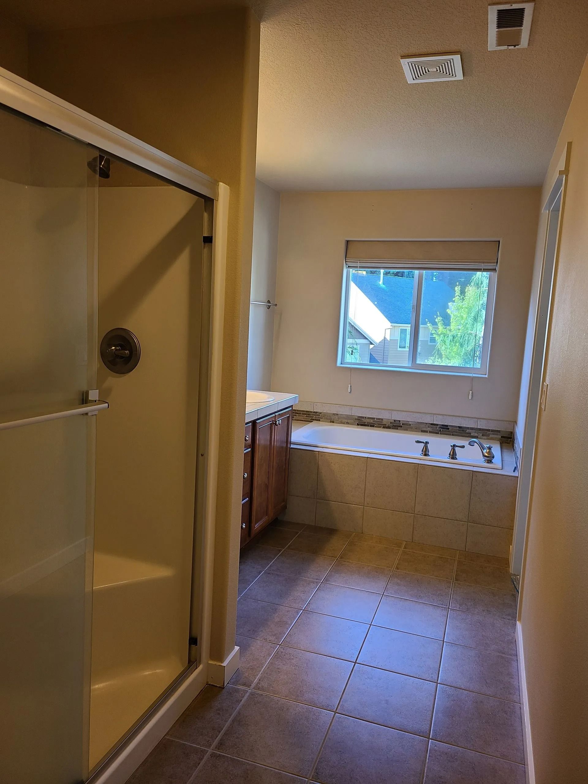 Bathroom featuring large window view