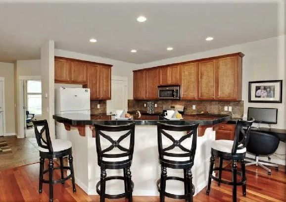 Kitchen island with bar stools
