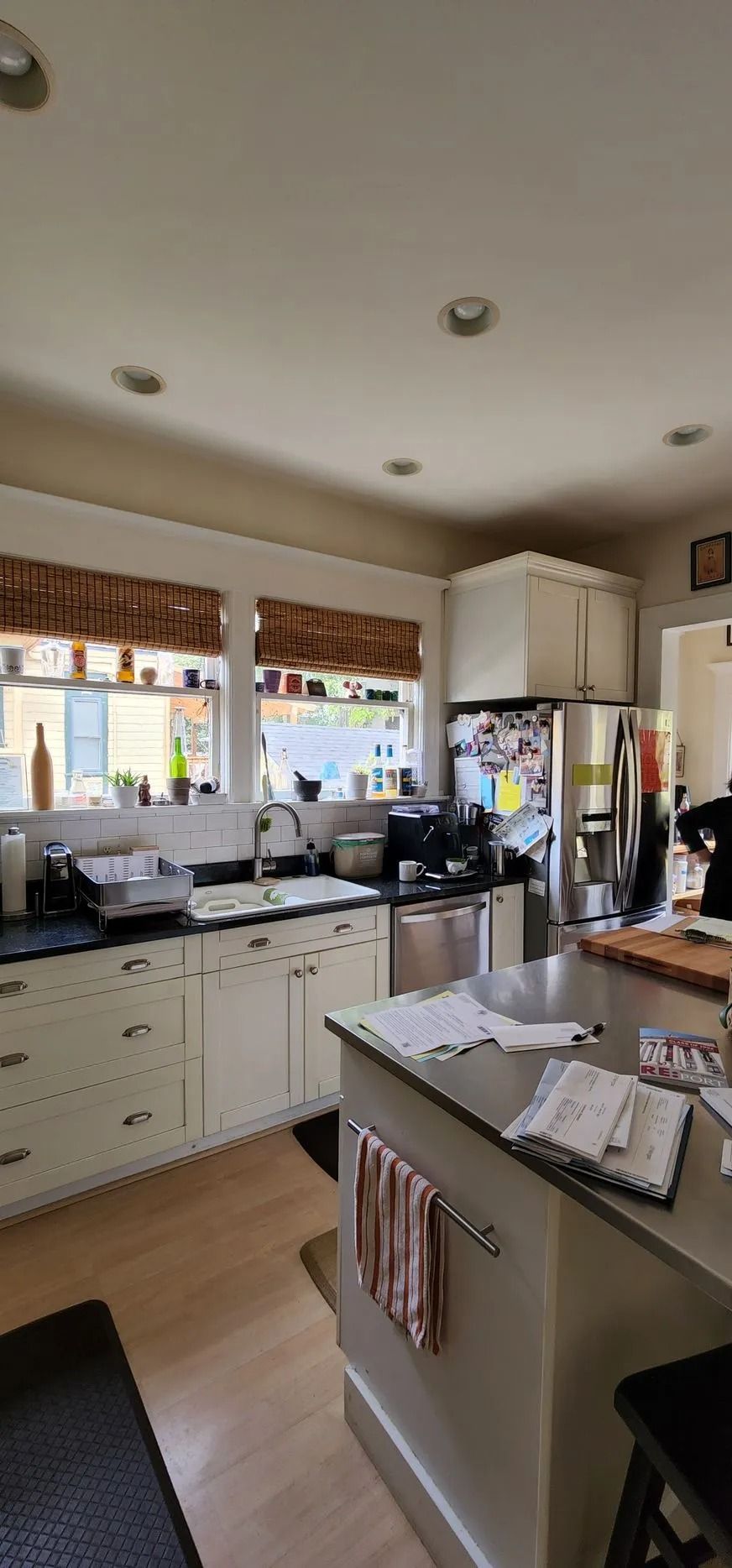 Modern kitchen with white cabinets and appliances