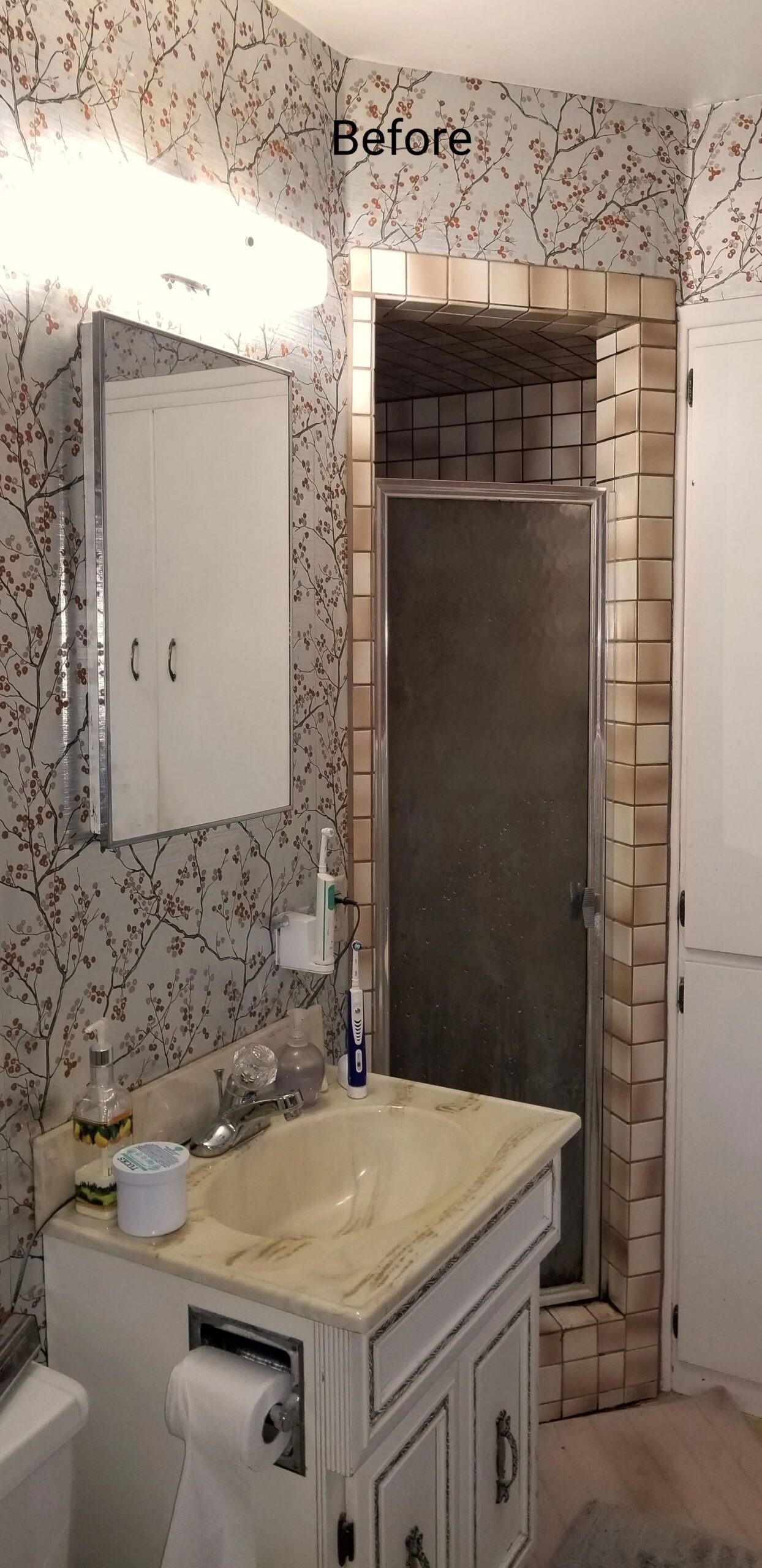 Compact bathroom with beige sink