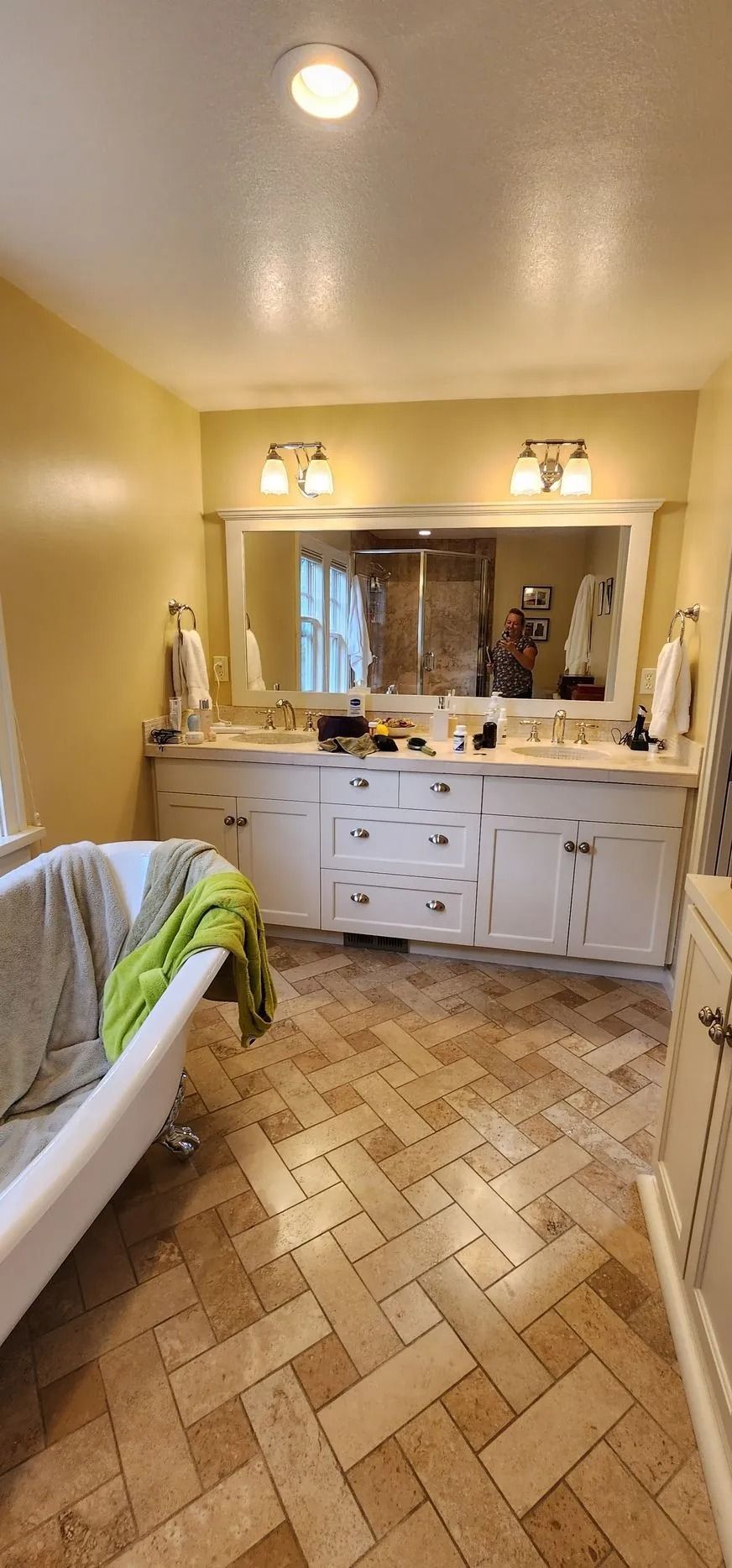 Herringbone floor in elegant bathroom