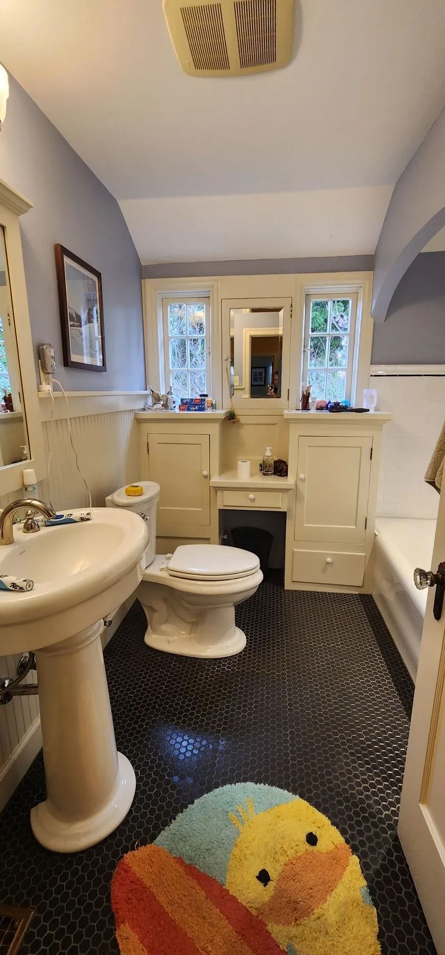 Bright bathroom with pedestal sink