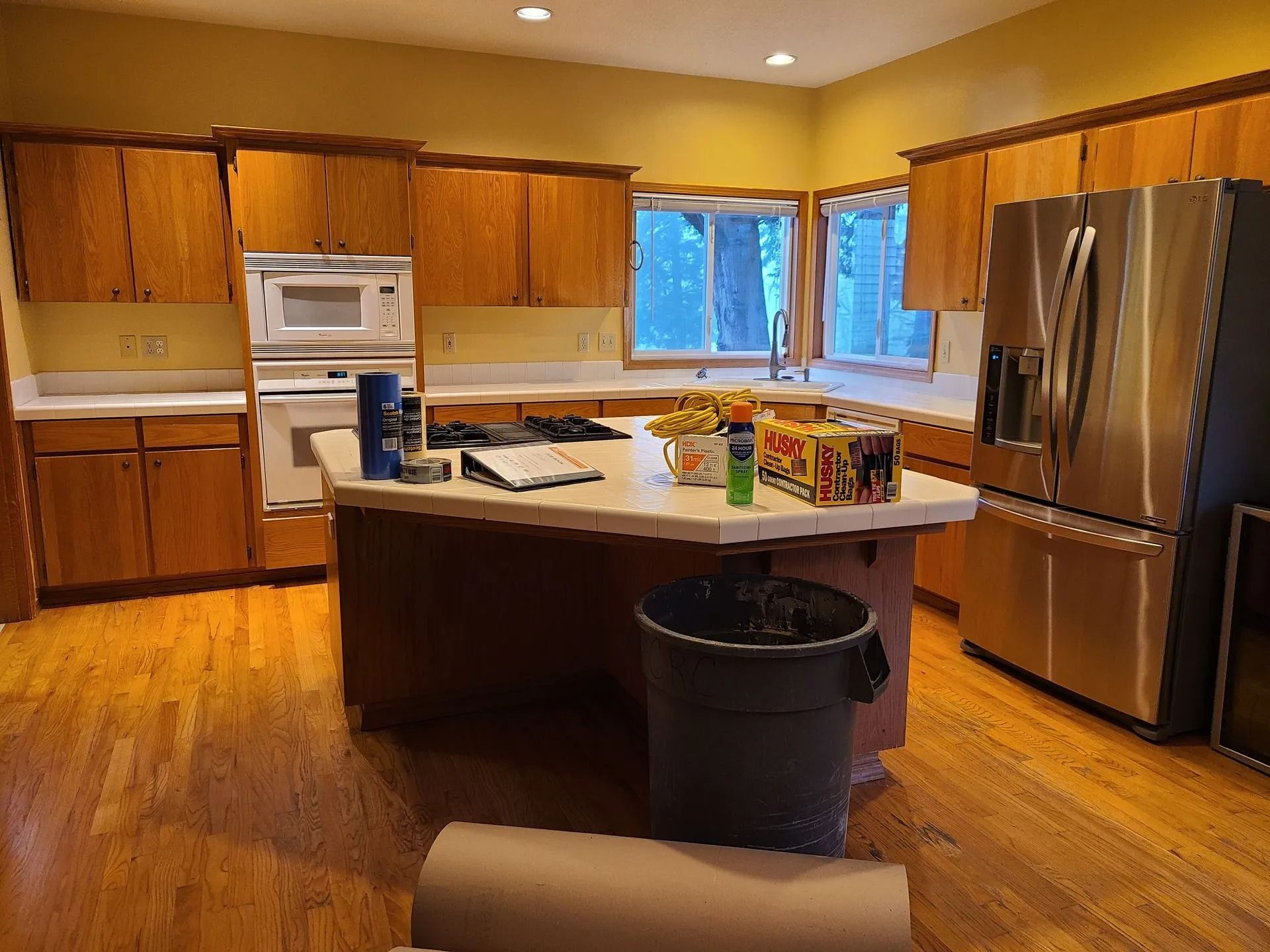 Wooden kitchen with stainless steel appliances