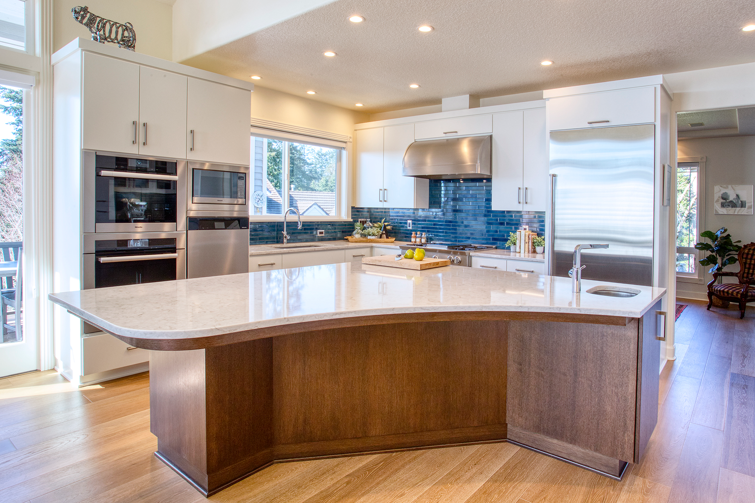 Modern kitchen with large island and stainless appliances