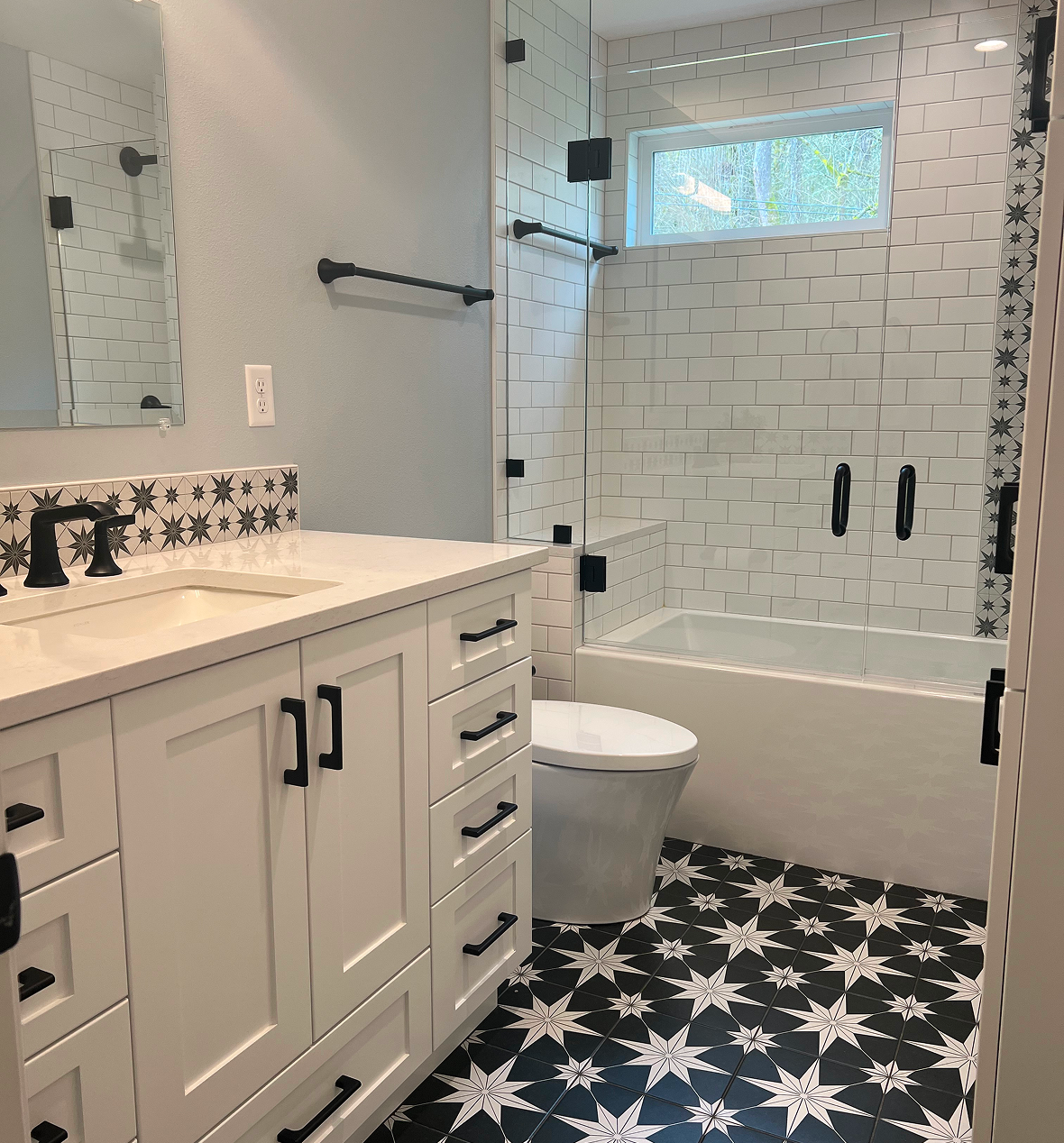 Modern bathroom with black-and-white star tiles