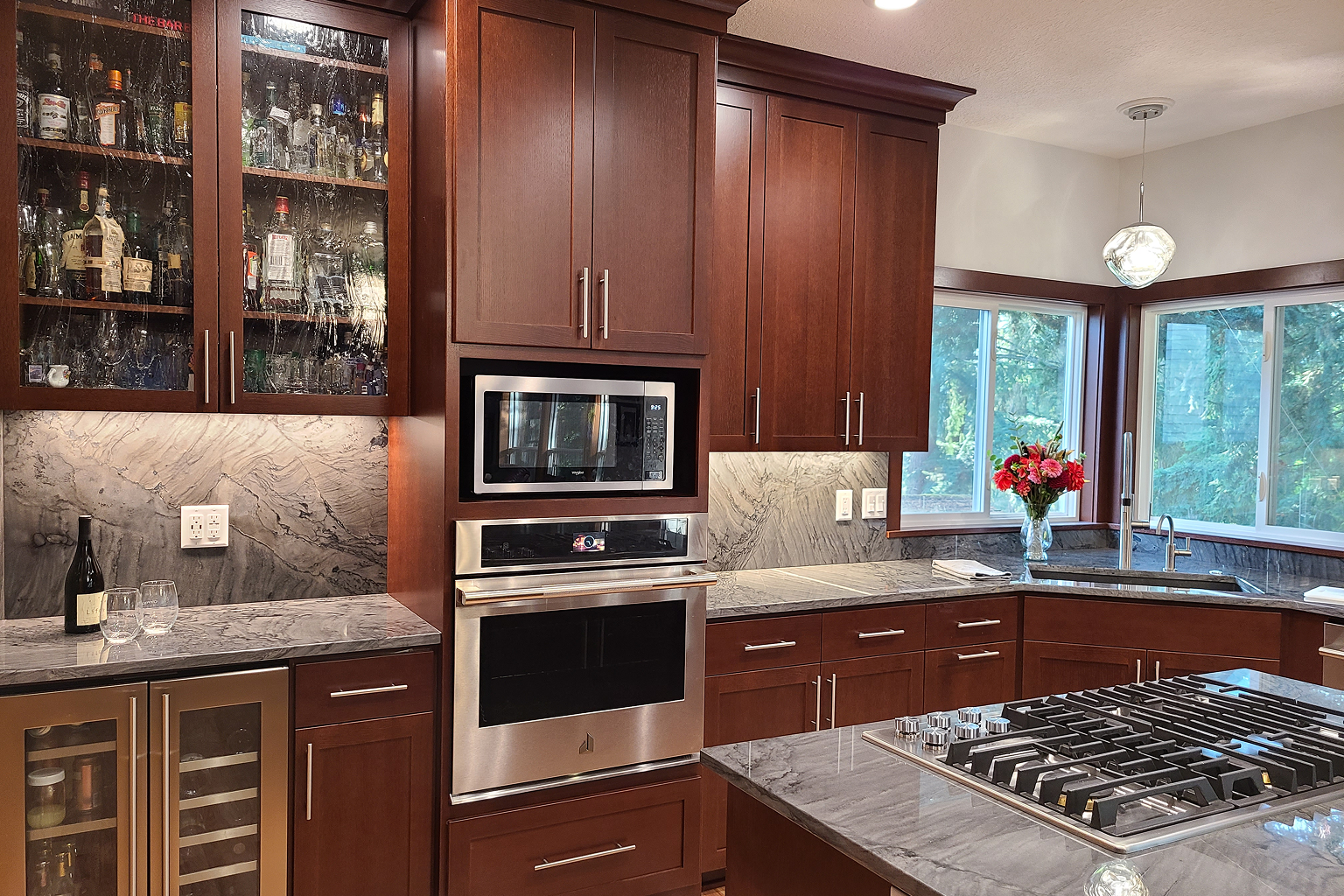 Modern kitchen with cherry cabinets and island