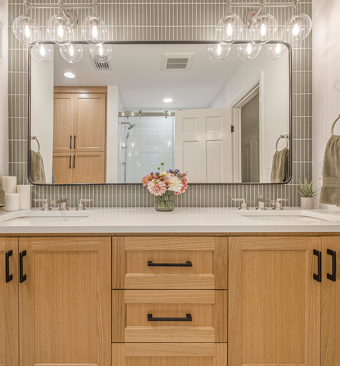 Wood double-sink bathroom vanity with flowers