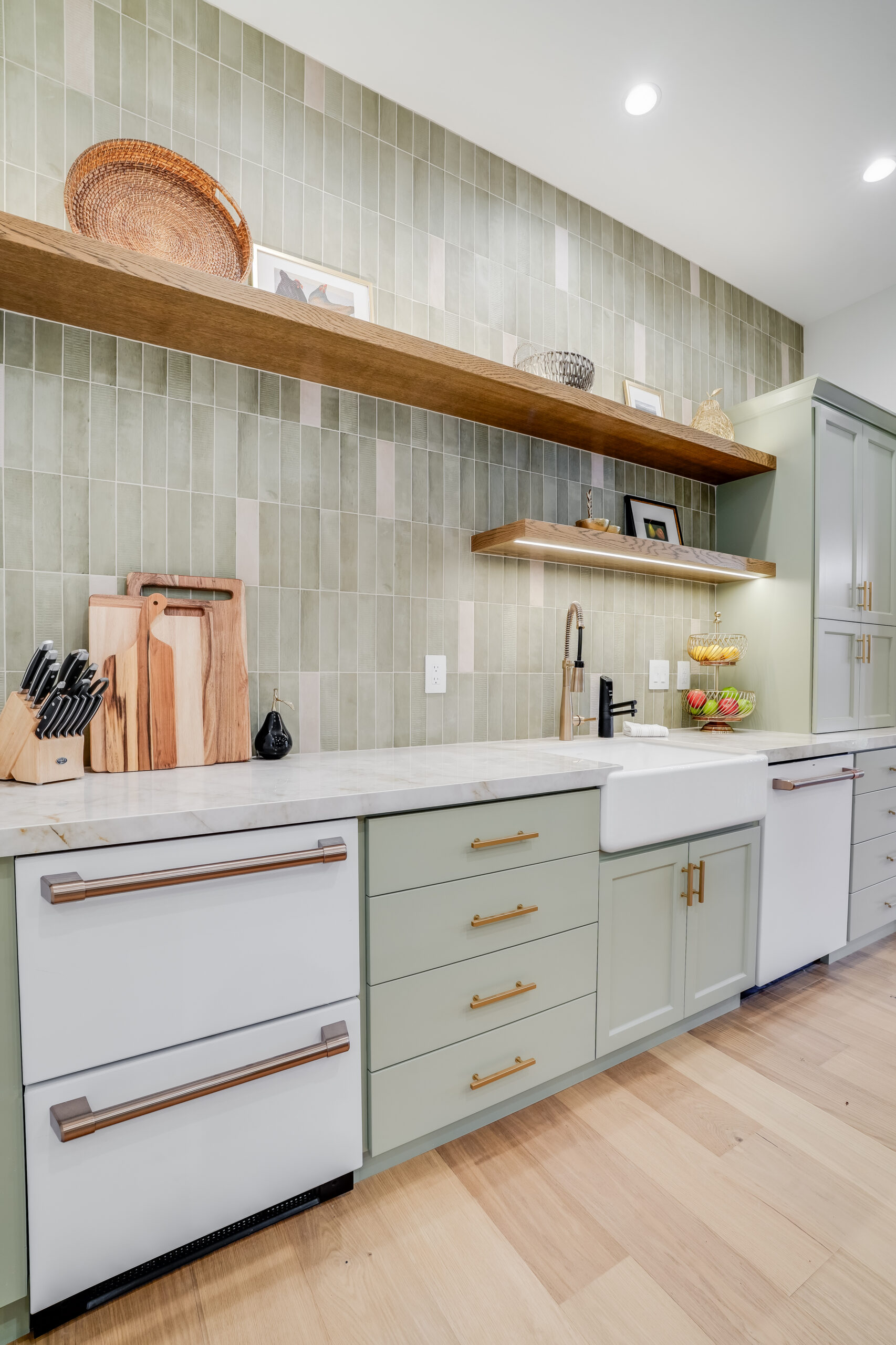 Modern green kitchen with farmhouse sink